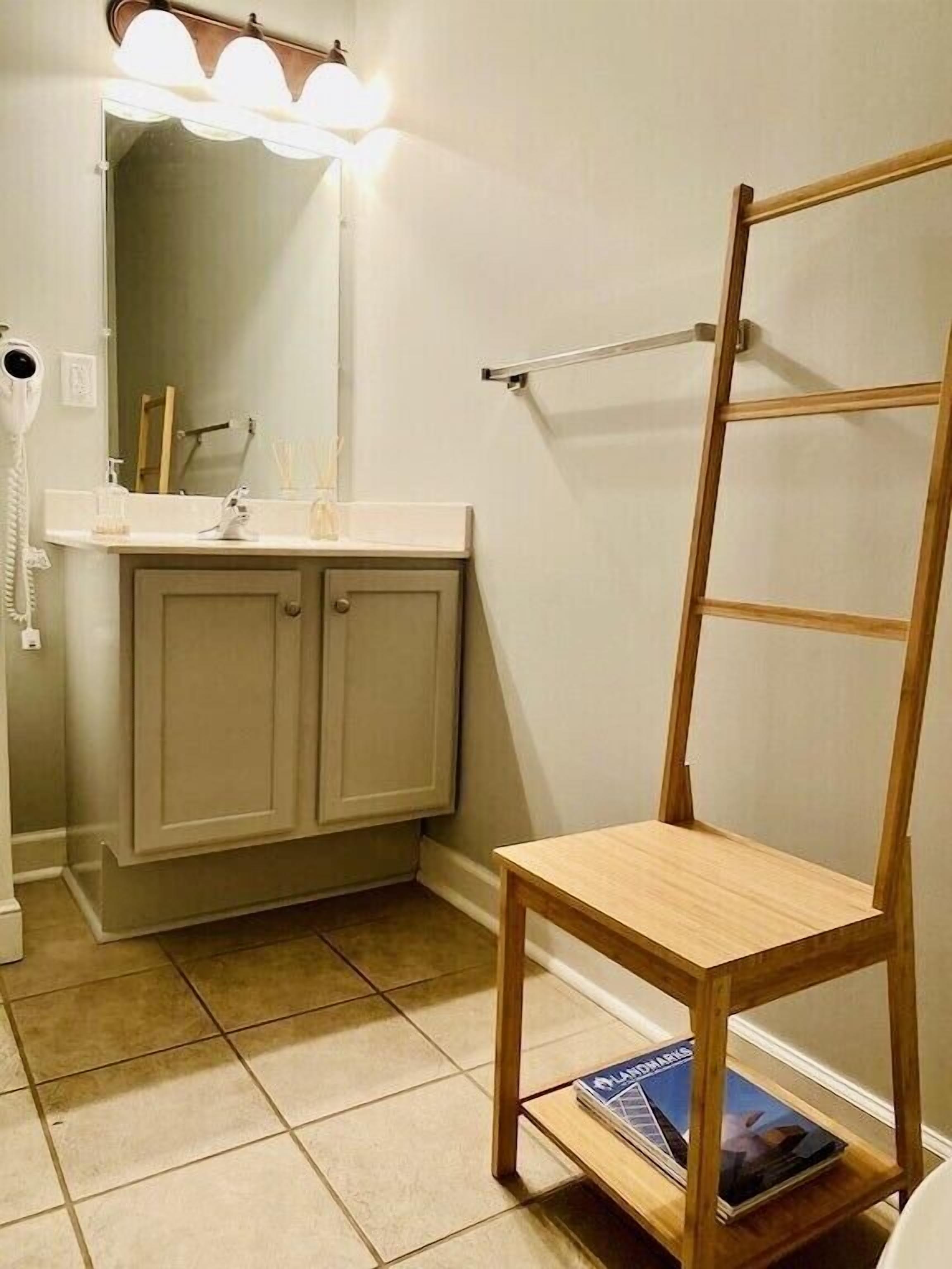 Combined shower/tub, hair dryer, towels, soap