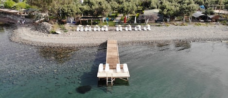 Private beach, white sand, free beach shuttle, sun-loungers