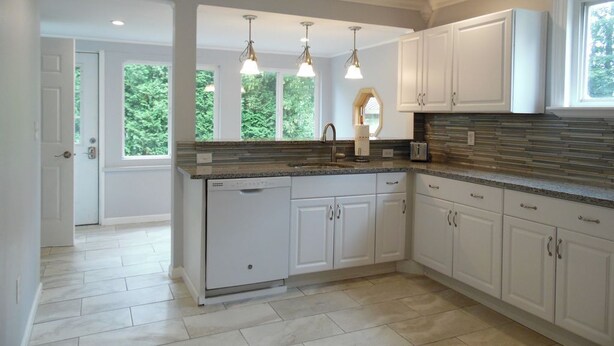 A kitchen with white cabinets, a granite countertop, and pendant lighting. - WATKINS GLEN GUEST HOUSE, CLOSE TO EVERYTHING! (Watkins Glen)