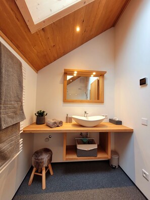 Shower, hair dryer, towels, toilet paper