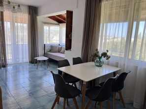 Luxury Apartment, 1 Bedroom | Living area | 32-inch flat-screen TV with satellite channels, TV