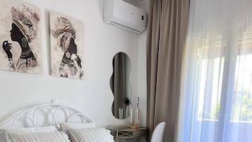 Luxury Apartment, 1 Bedroom | Desk, laptop workspace, iron/ironing board, free WiFi