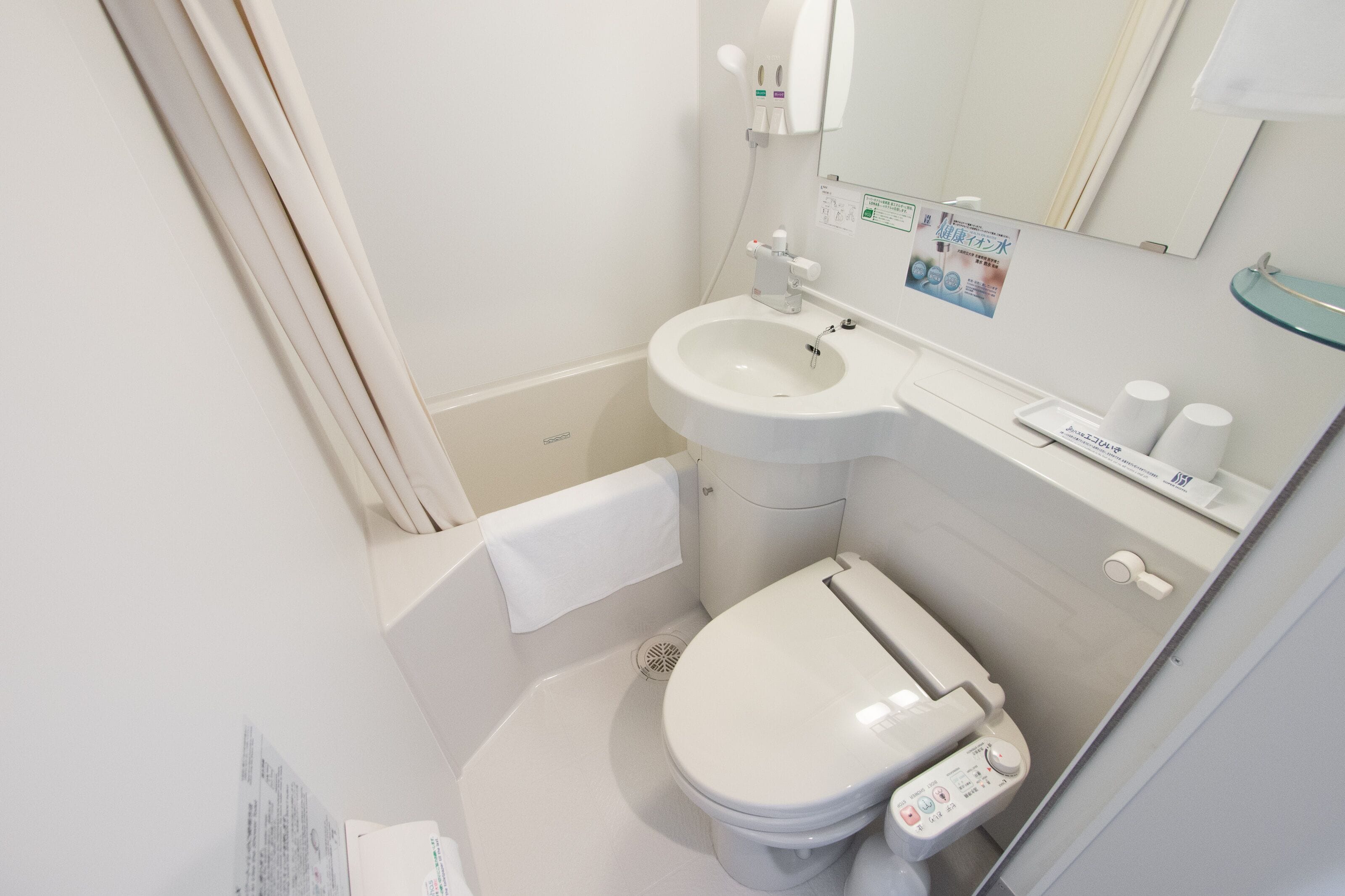 combined shower/bathtub, free toiletries, hair dryer, slippers