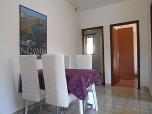 Enjoy meals in this stylish dining area with a dining table and four chairs.
