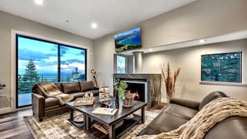 Smart TV, chimenea, futbolito y tenis de mesa