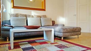 Apartment, 2 Bedrooms, Terrace | Living room | Flat-screen TV, books, stereo