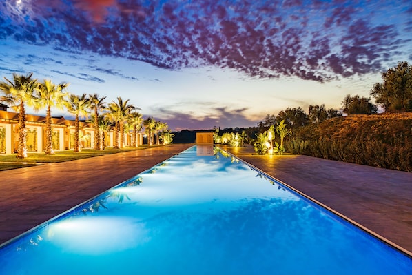Seasonal outdoor pool, pool umbrellas, sun loungers