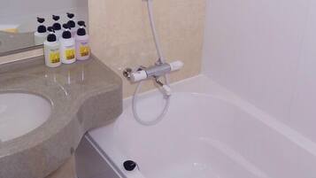 Separate tub and shower, deep soaking tub, free toiletries, hair dryer