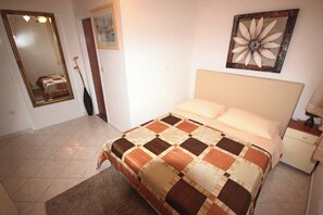 Appartement, 1 chambre, terrasse, vue jardin | 2 chambres, draps fournis