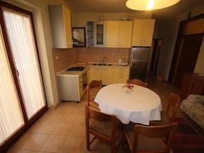 Apartment, 2 Bedrooms, Balcony | Dining room