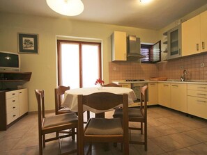 Apartment, 2 Bedrooms, Balcony | Dining room