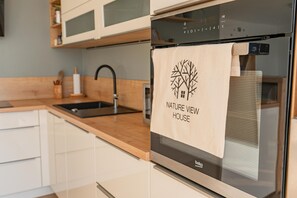 House (Three bedroom house) | Private kitchen | Fridge, coffee/tea maker