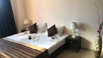 Room, 1 Bedroom, Smoking, Refrigerator | 1 bedroom, bed sheets