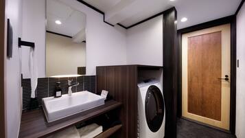 Separate tub and shower, free toiletries, slippers, towels