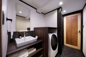 Separate tub and shower, free toiletries, slippers, towels