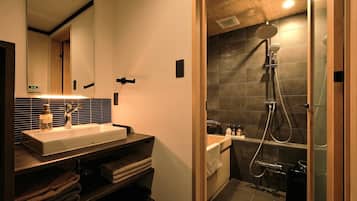 Separate tub and shower, free toiletries, slippers, towels