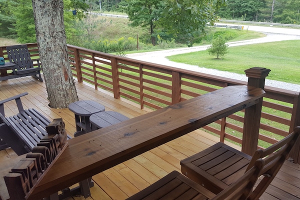 Bar top separating covered and uncovered deck