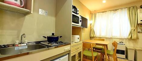 Fridge, microwave, stovetop, cookware/dishes/utensils