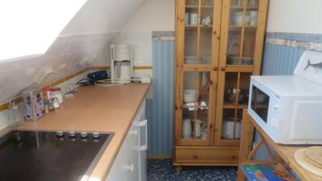 Fridge, microwave, coffee/tea maker, toaster