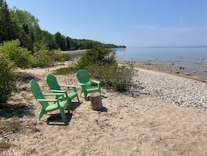 On the beach, sun-loungers
