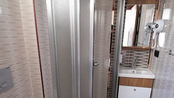 Standard Double or Twin Room | Bathroom | Shower, hair dryer, slippers, towels