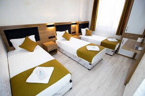 Standard Triple Room | 1 bedroom, minibar, individually decorated, individually furnished