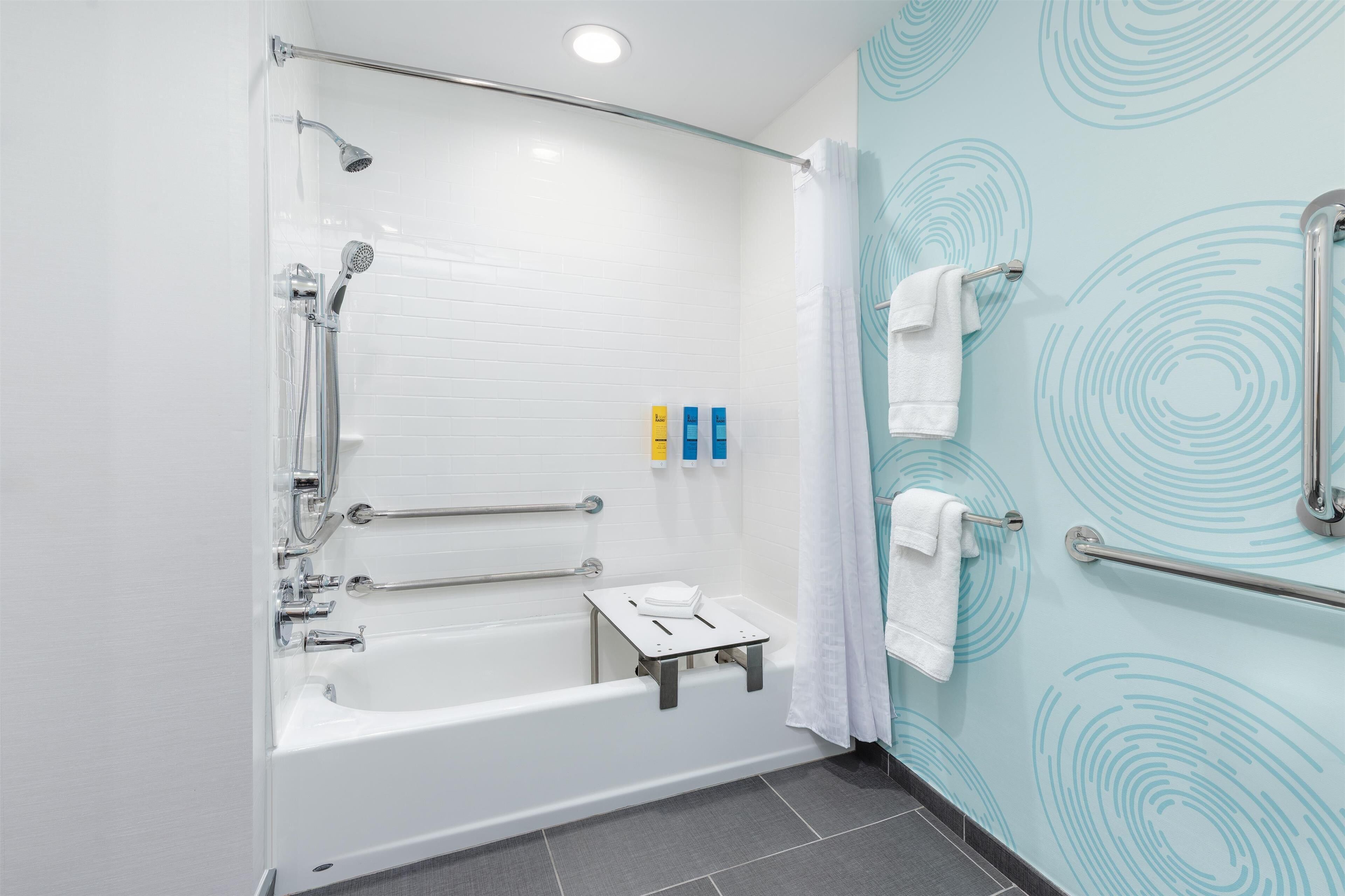 hydromassage showerhead, hair dryer, towels