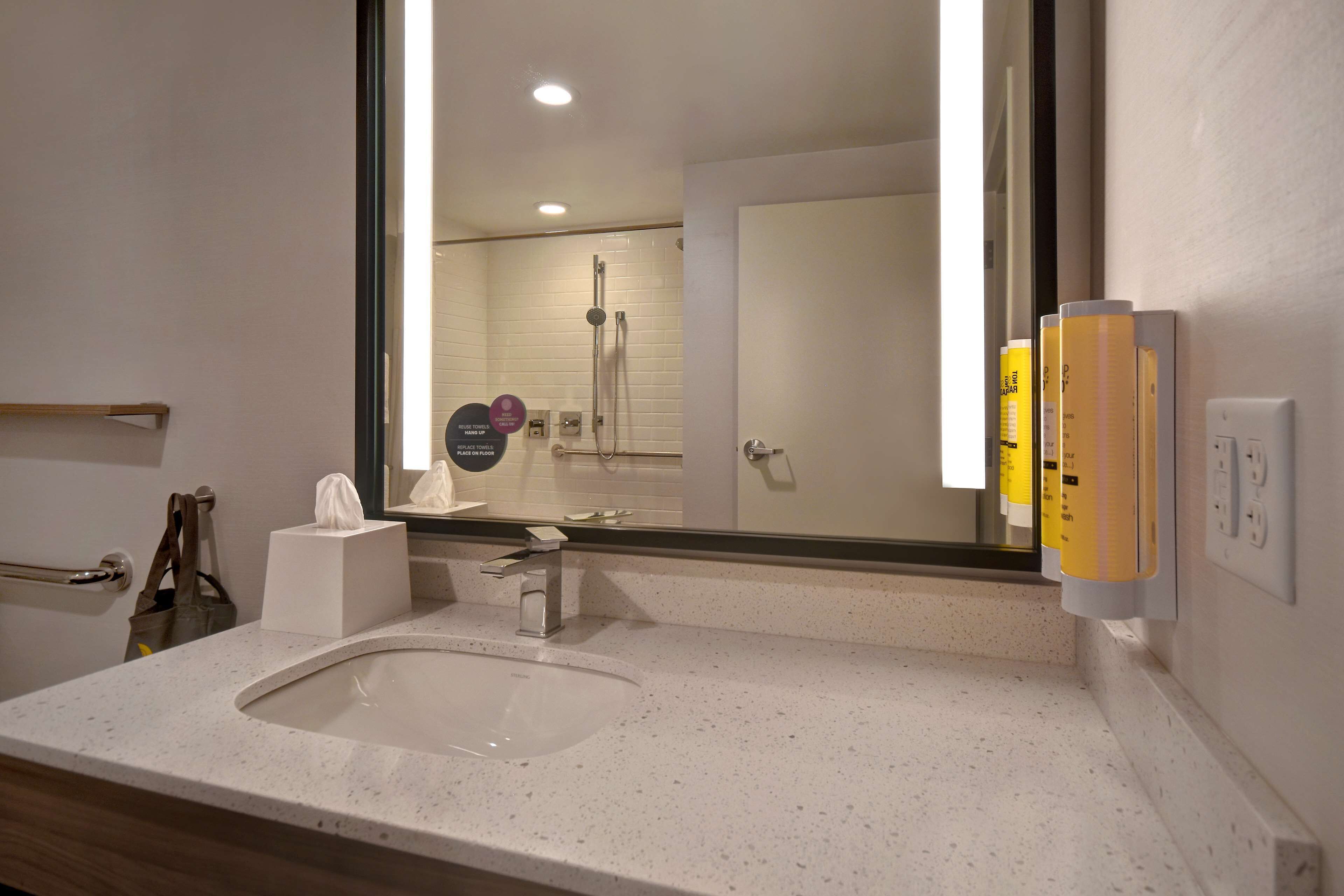 hair dryer, towels, soap, shampoo