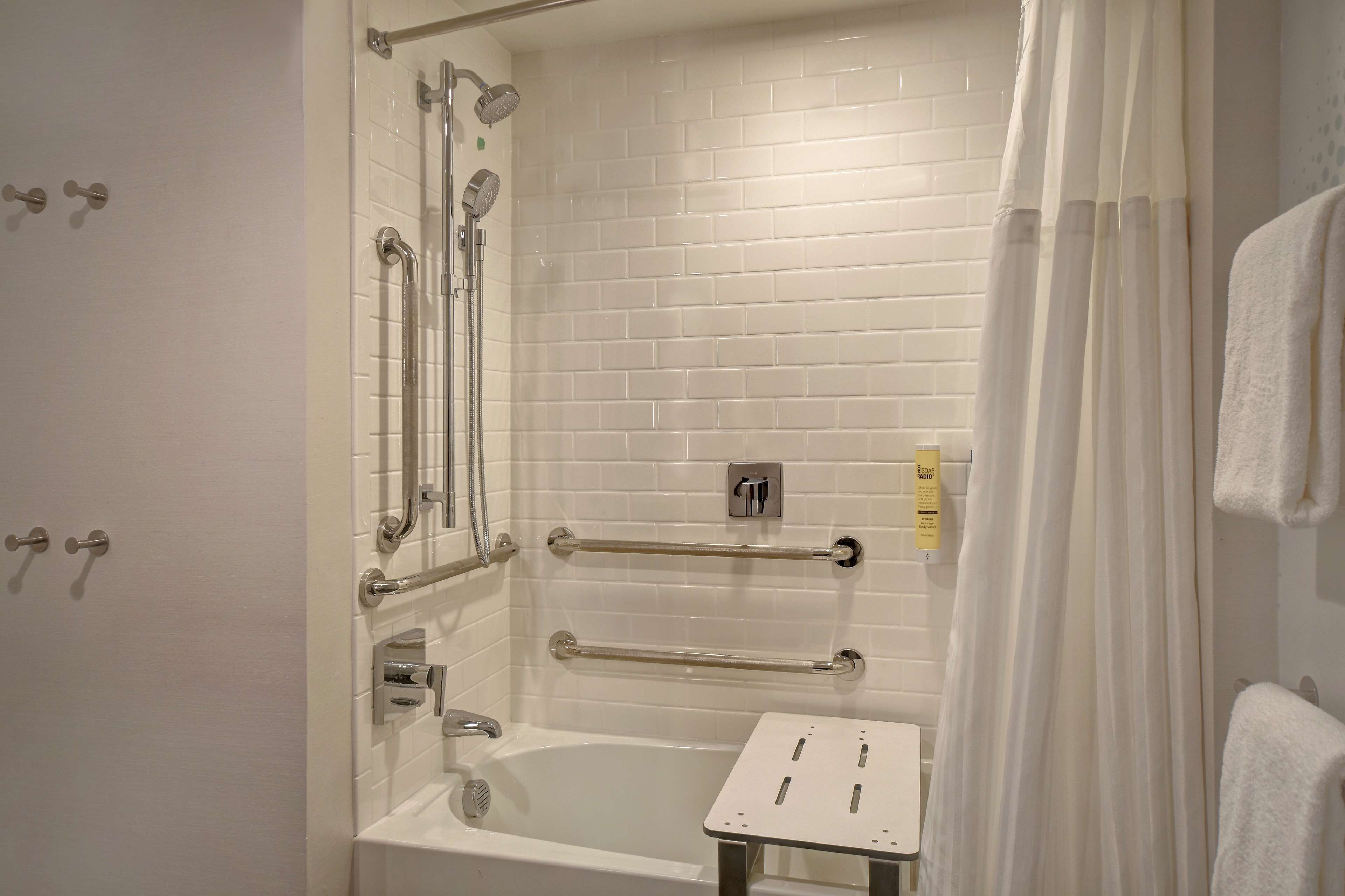 hair dryer, towels, soap, shampoo