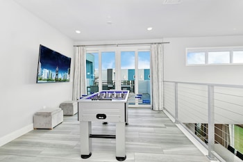 Luxury Condo, 5 Bedrooms, Pool Access (Two Story Deluxe) | Living area | 42-inch TV with satellite channels at Spectrum Resort Villas Orlando and Waterparks