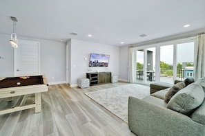 Room, Multiple Beds (4 Bedroom Luxury Two Story Condo) | Living area | 42-inch TV with satellite channels