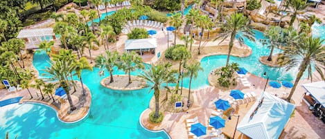 Outdoor pool, pool loungers, lifeguards on site