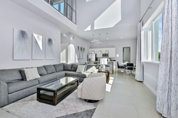 Luxury Condo, 5 Bedrooms, Pool Access (Two Story Deluxe) | Living area | 42-inch TV with satellite channels at Spectrum Resort Villas Orlando and Waterparks
