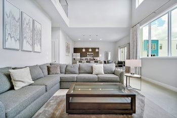 Luxury Condo, 4 Bedrooms, Pool Access (Two Story) | Living area | 42-inch TV with satellite channels at Spectrum Resort Villas Orlando and Waterparks