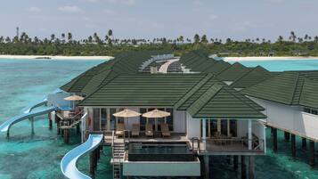 Water Pavilion with Pool + Slide - Free shared seaplane for 2 guests, minimum 7-night stay | Egyptian cotton sheets, premium bedding, down comforters