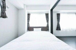 2 dormitorios, tabla de planchar con plancha, wifi gratis y ropa de cama