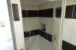 Shower, hair dryer, soap, shampoo