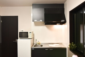 Fridge, microwave, stovetop, cookware/dishes/utensils