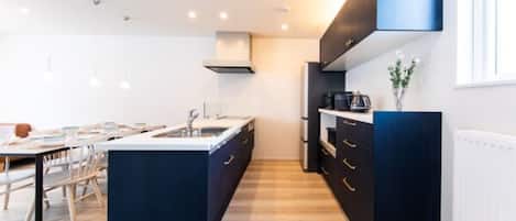 Fridge, microwave, stovetop, cookware/dishes/utensils