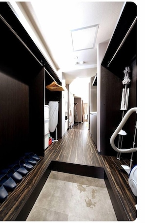 Stylish corridor with seating areas and a clean floor.