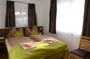 2 bedrooms, travel cot, WiFi, bed sheets