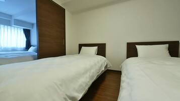 2 dormitorios, tabla de planchar con plancha, wifi gratis y ropa de cama