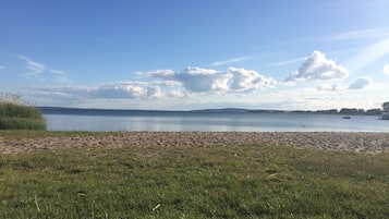 On the beach, sun-loungers
