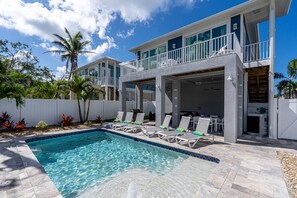 A heated pool - 5541 Pool Oasis: Spacious Home, Balconies, Pet-Friendly (Fort Myers Beach)