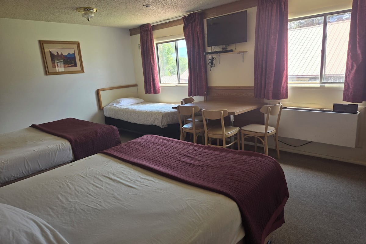 executive quadruple room | living area | 32-inch flat-screen tv with cable channels, tv