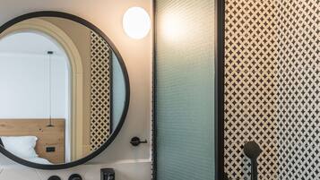 Shower, free toiletries, hair dryer, slippers