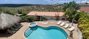 spacious apartment with lovely terrace overlooking the pool and nature reserve