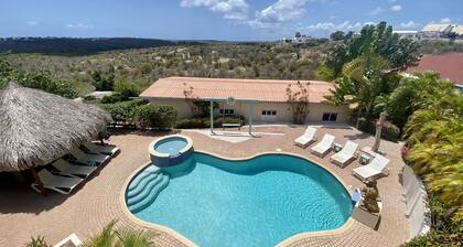 spacious apartment with lovely terrace overlooking the pool and nature reserve