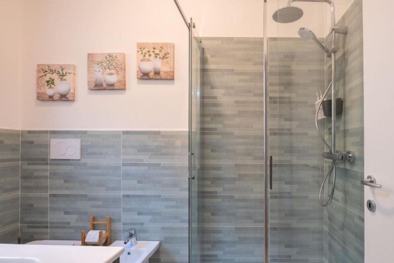 Shower, free toiletries, hair dryer, slippers