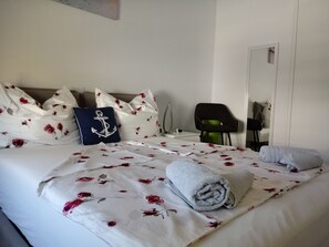 2 habitaciones, tabla de planchar con plancha y cuna de viaje 
